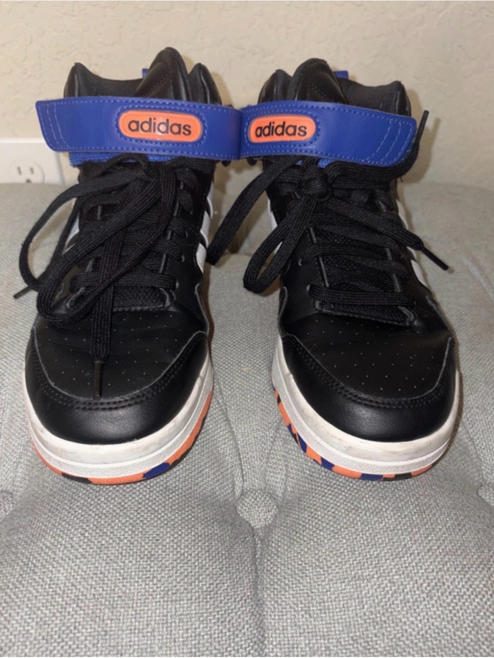 Nike Kids' Black Sneakers with Blue and Orange Accents